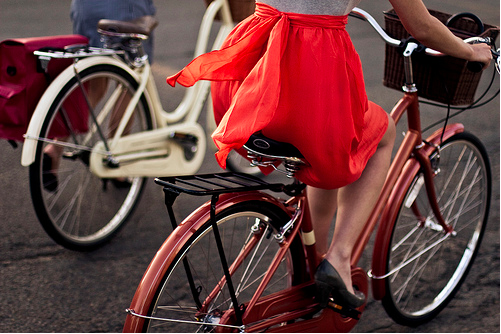 Girl in red dress on red bicycle 500x333 happy weekend 