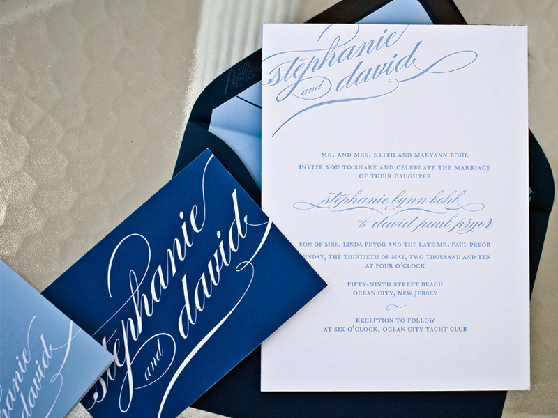 Stephanie designed her own wedding invitations incorporating a blue color 
