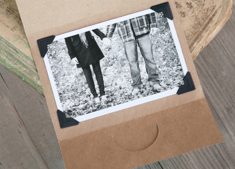  reveals our wedding date and a black and white engagement photo mounted 