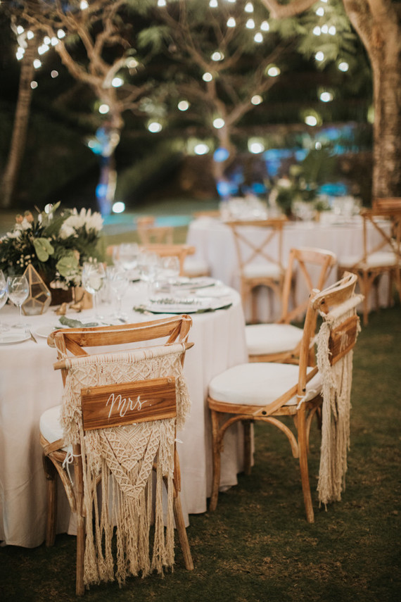 MacramÃ© Boho Wedding Chair Signs / Photo Credit: Illumien Photography via 100 Layer Cake