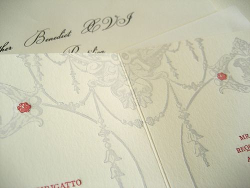 The ink colors are Venetian red and silver grey printed on ecru paper