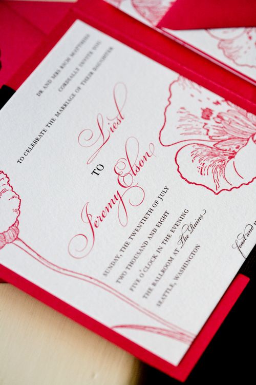From Liesl The wedding invitations were a beautiful coral red color 
