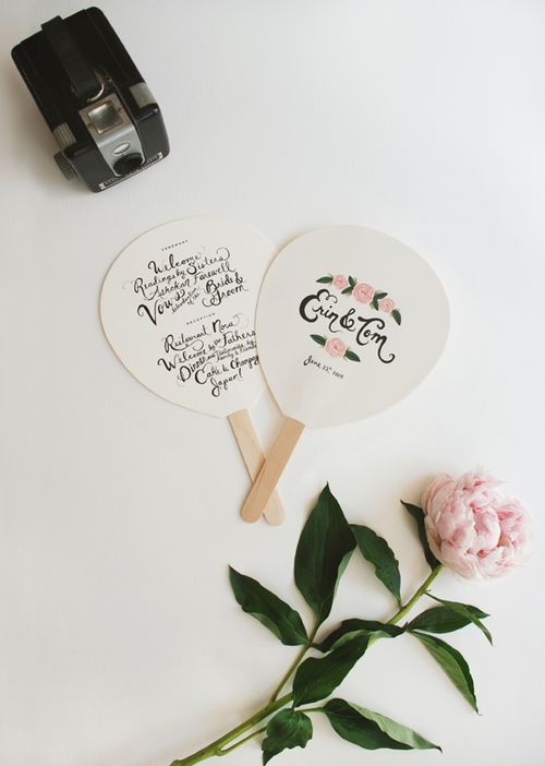 I love the idea of having fans serve as wedding programs and these 