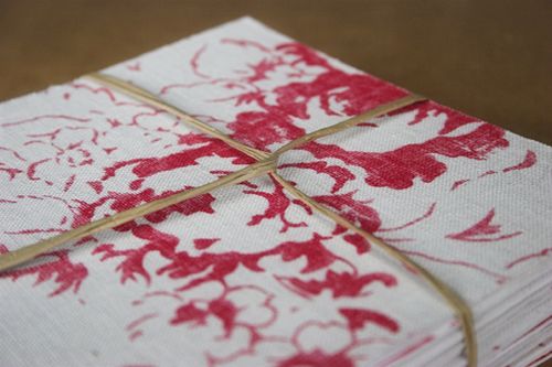  use a nontraditional material in their wedding invitations like fabric 