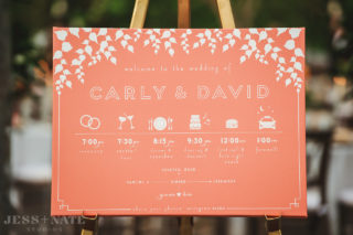 wedding signage schedule illustrated timeline coral pink