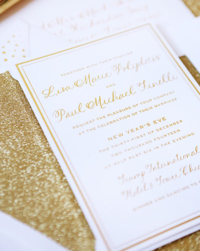 Lisa + Paul's Gold New Year's Eve Wedding Invitations